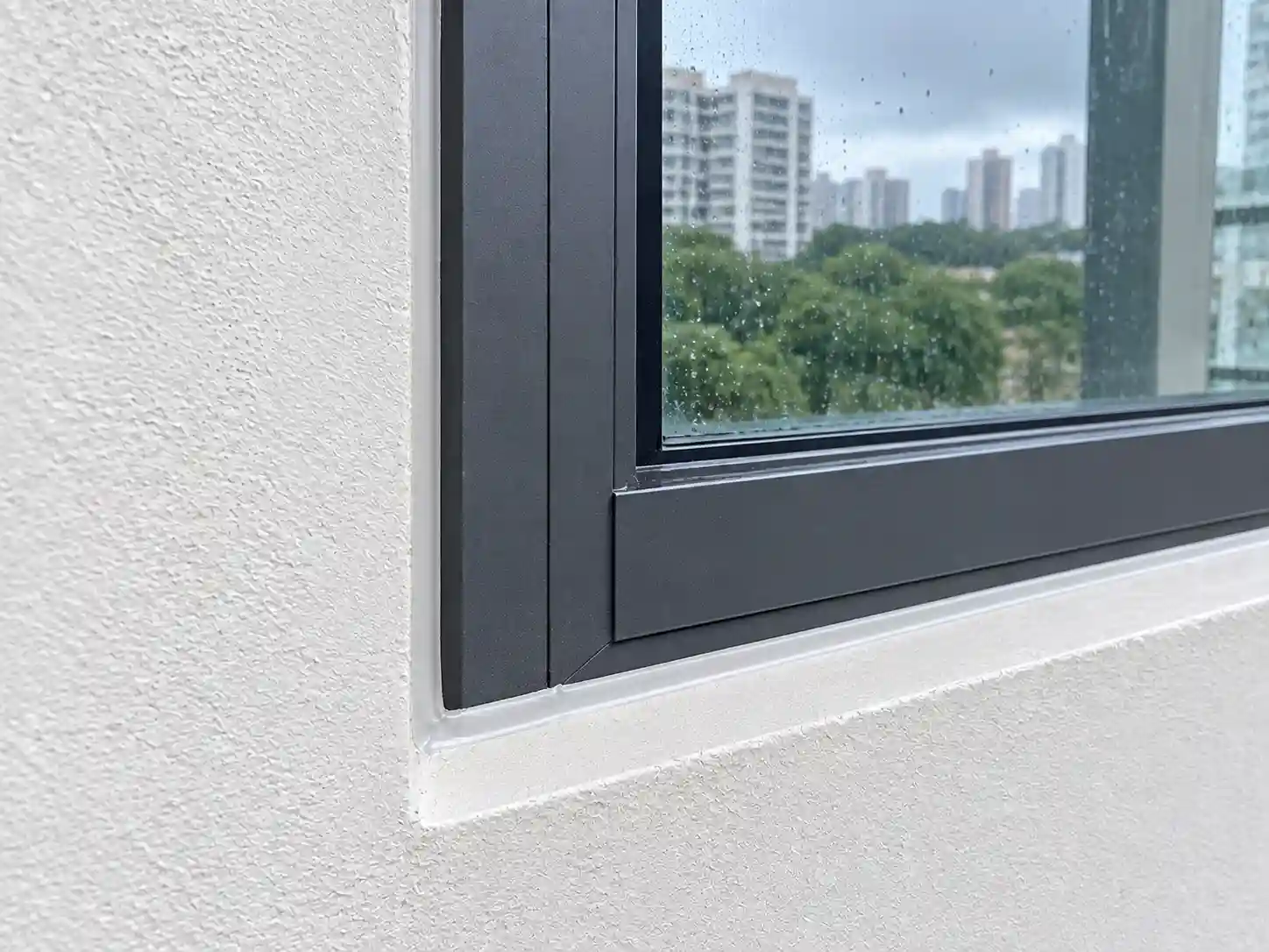 Fresh weather-resistant sealant around window frame